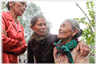 Three woman talking.