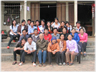 Extended family sitting rows for annual photograph.