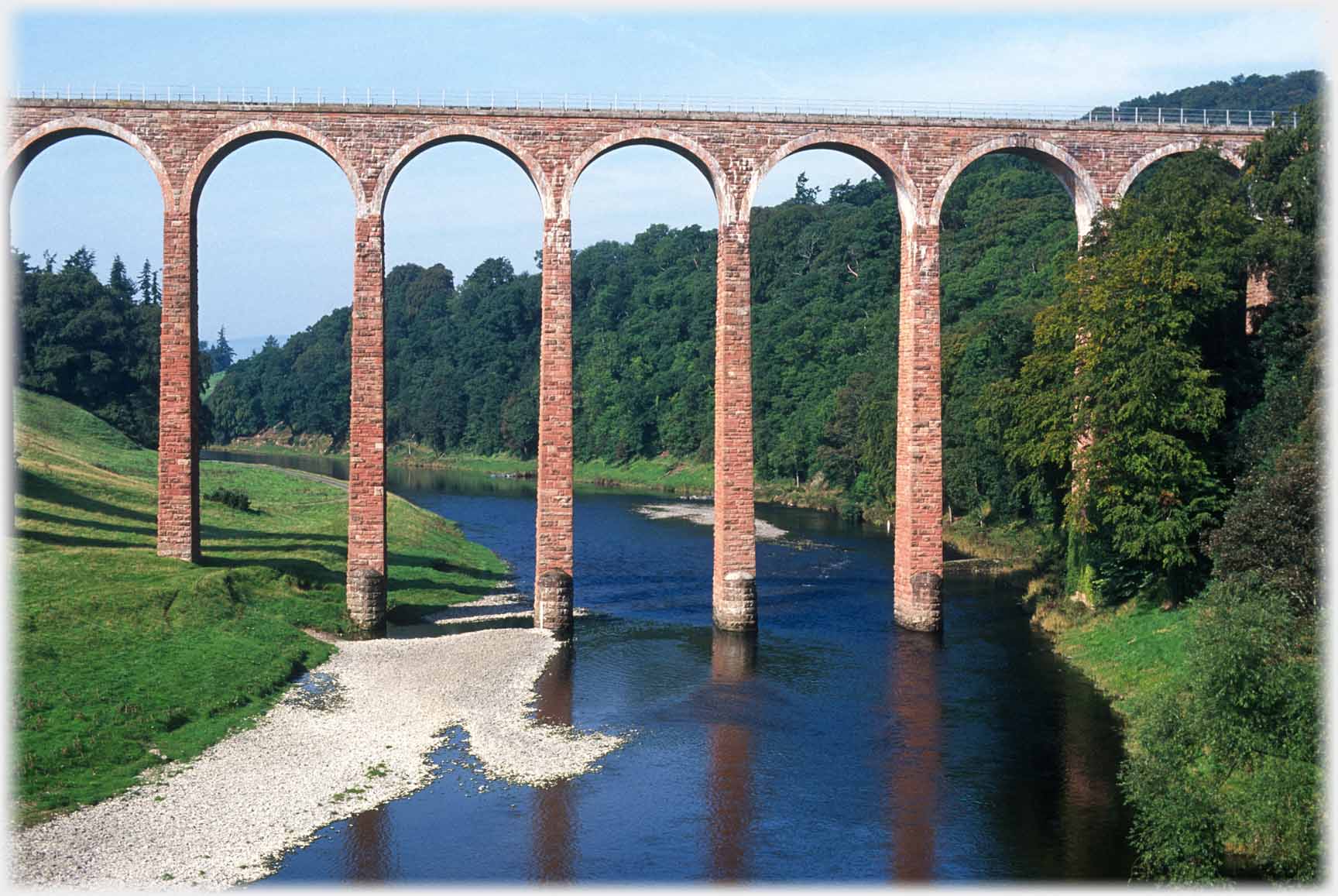 Central spans ove viaduct over river.