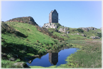 Smailholm Tower House with pool in front.