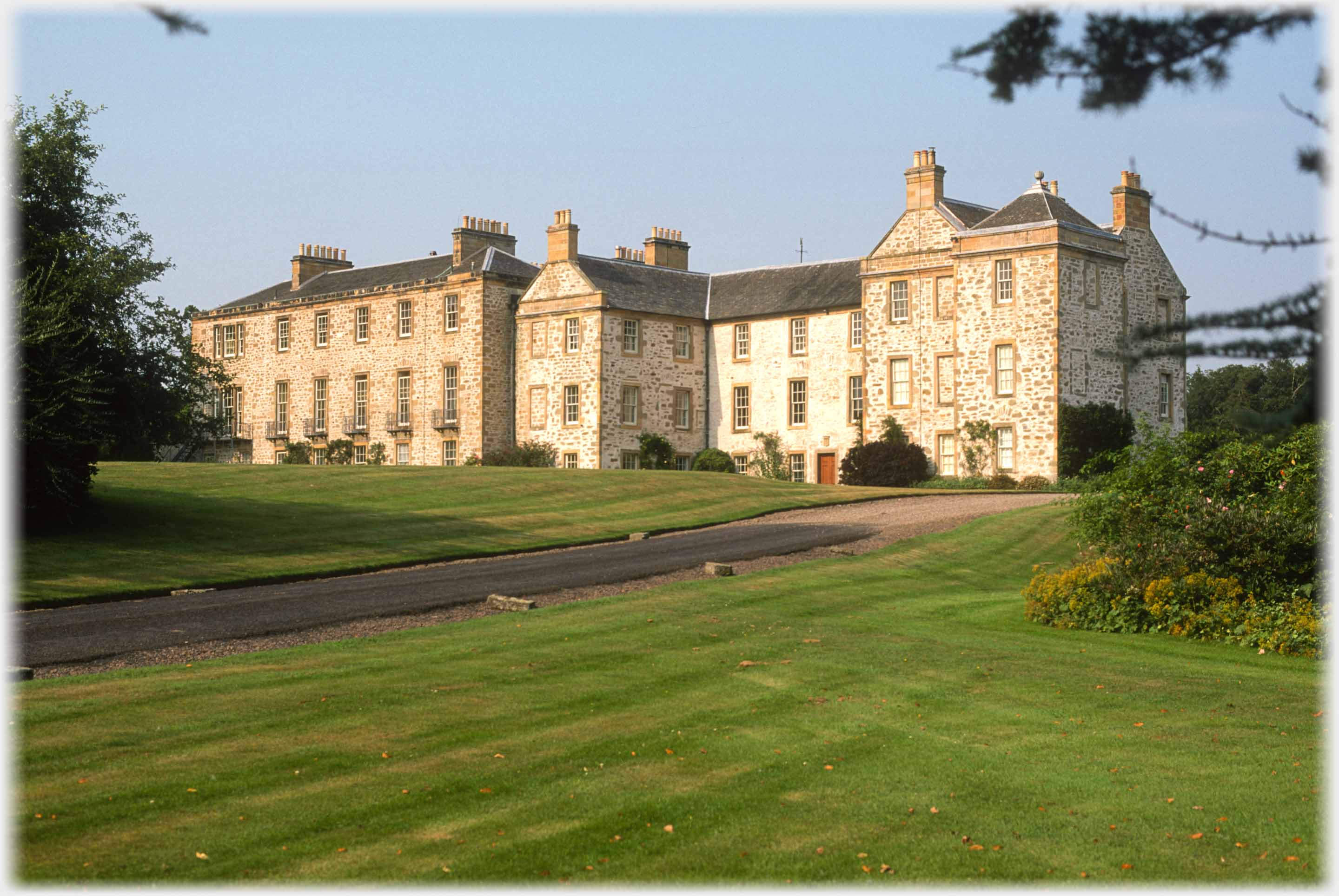 Lare three story stately house.