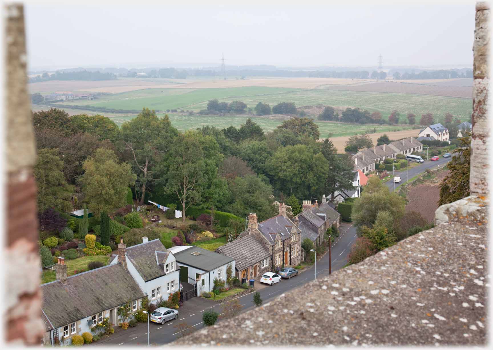 View over parapit of road of houses.