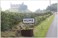 Sign saying Hume with castle above.