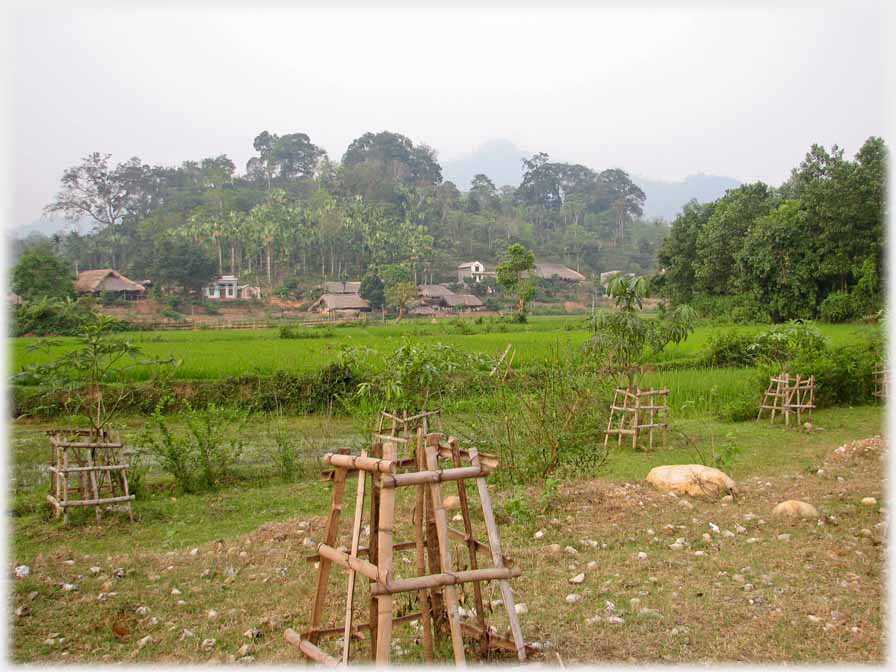 Village across fields.