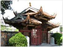 Elaborately roofed gatehouse.