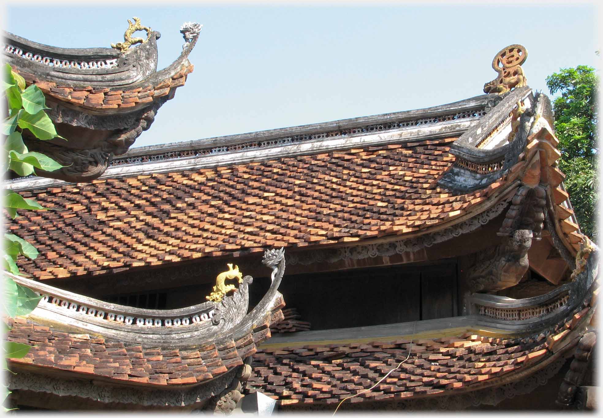 Tiled roofs with upturned ends.