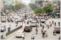 Large intersection with traffic sprawling into the distance.