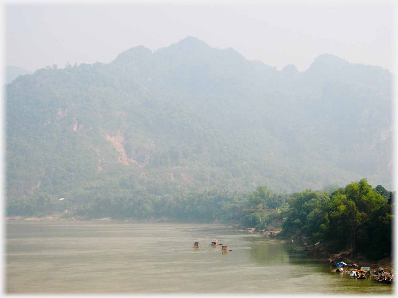 Foreground river with high hills beyond.